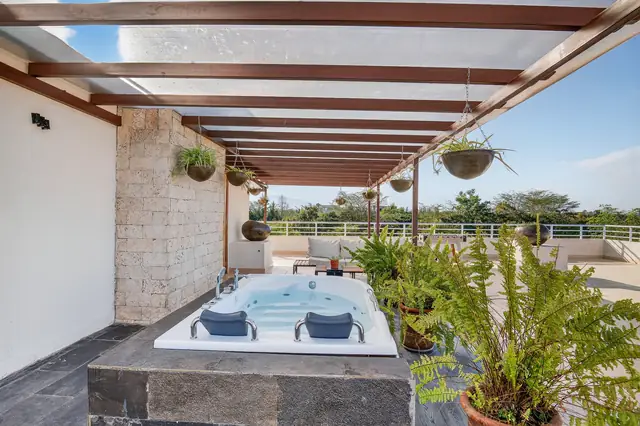 Kitchen with dining island at OSOTUA Villa 18